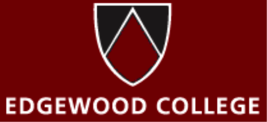 three people sitting in front of table laughing together