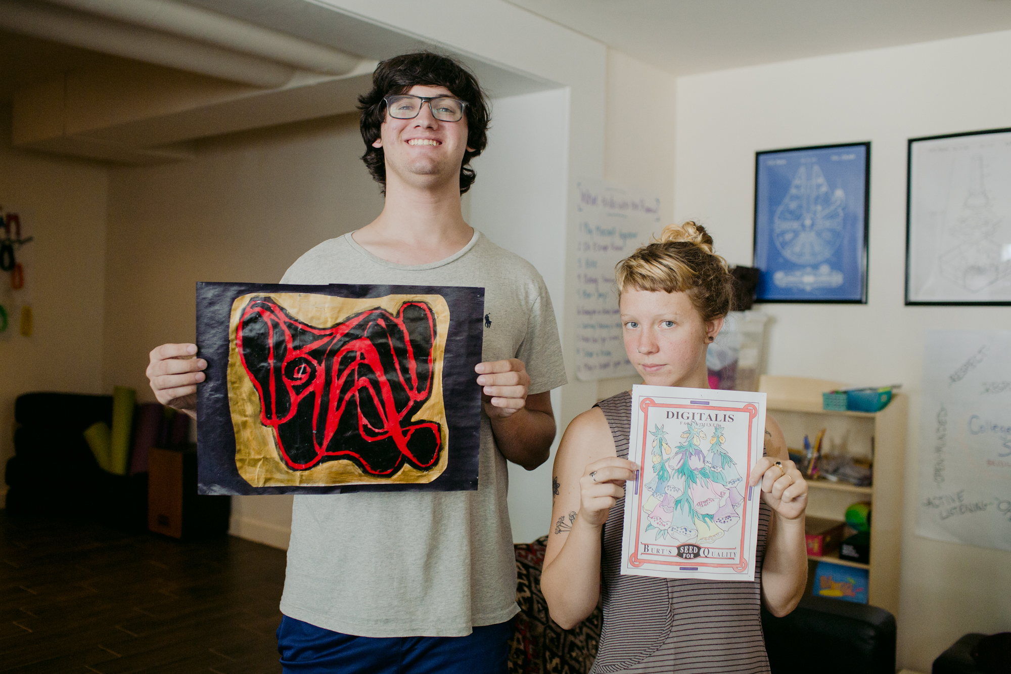 Mansfield Hall - Burlington - Two Students showing off their artwork