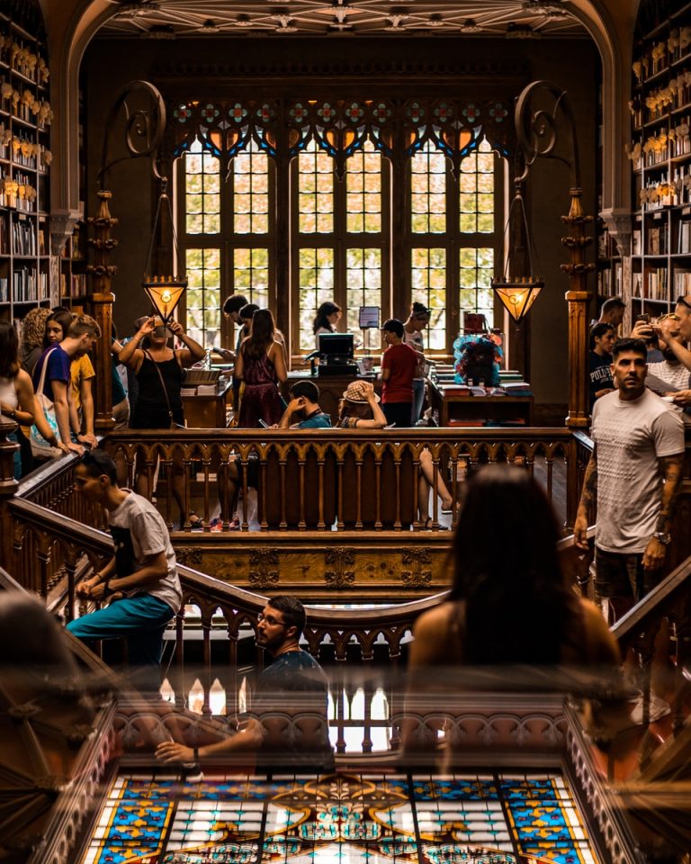 people in packed library at the opening of school