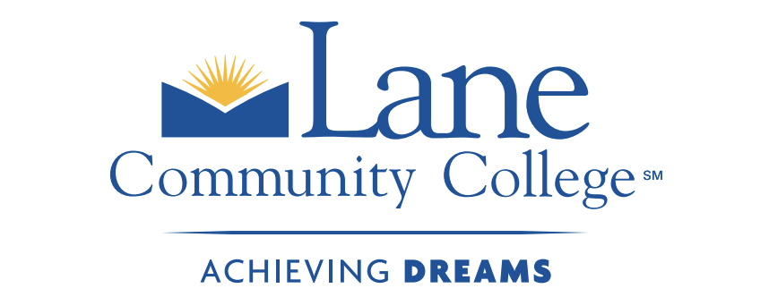 three people sitting in front of table laughing together